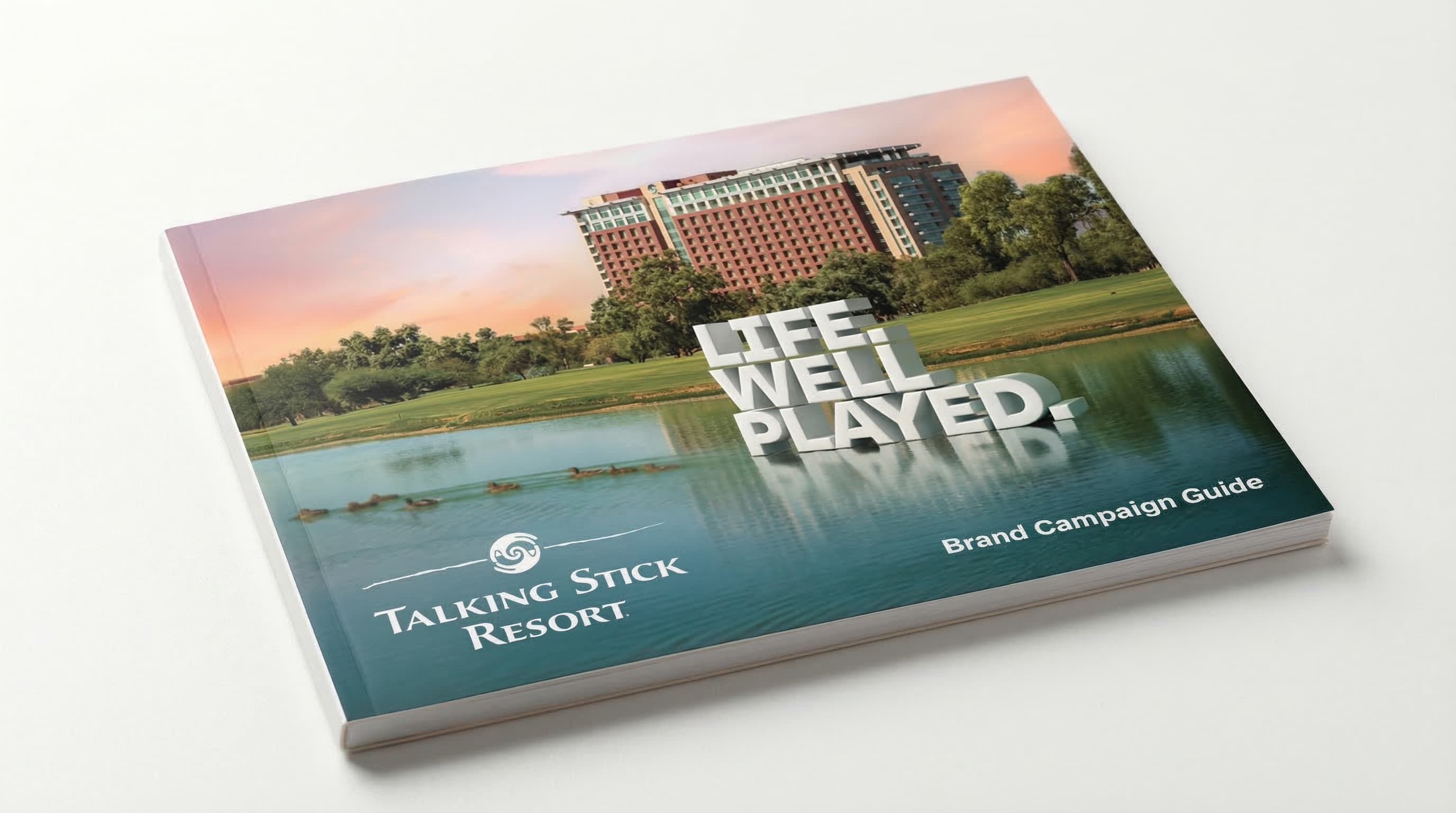 Life Well Played brand guide with resort at sunset